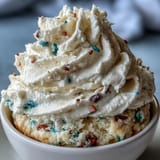 Creamy, funfetti dip layers create a vibrant Spring Birthday Party Funfetti Dip Cake.